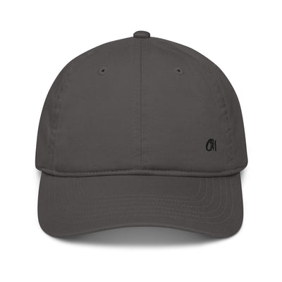Organic cotton dad hat in charcoal, unstructured 6-panel with adjustable brass slider.